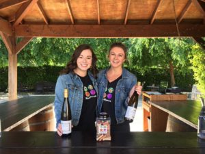 Our very own Michelle and Emma loved hanging out with the dogs and serving wine at our Wine and Paws event!